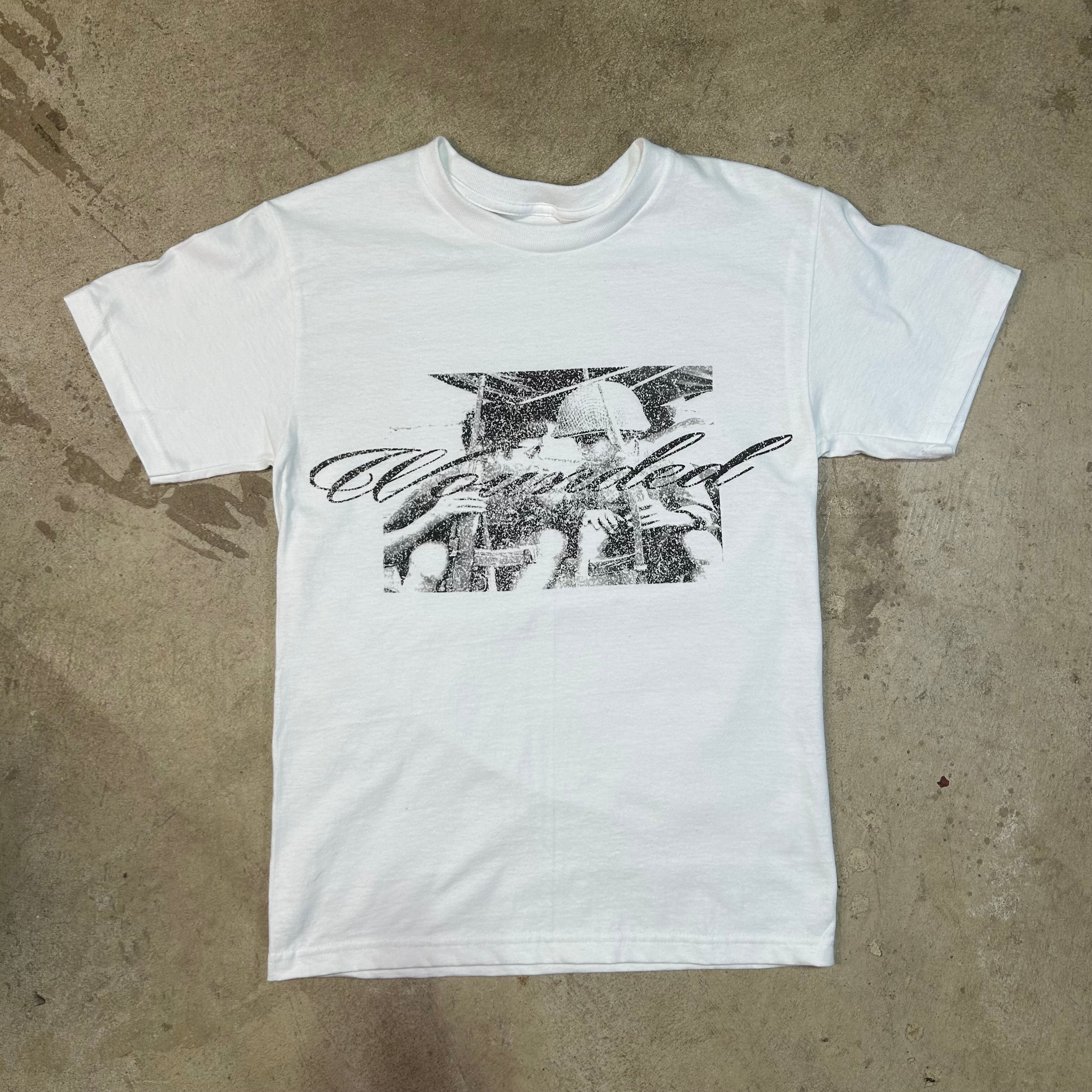 "WOUNDED" TEE