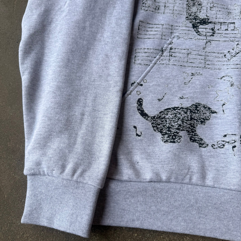 “SYMPHONY OF PAWS" HOODIE