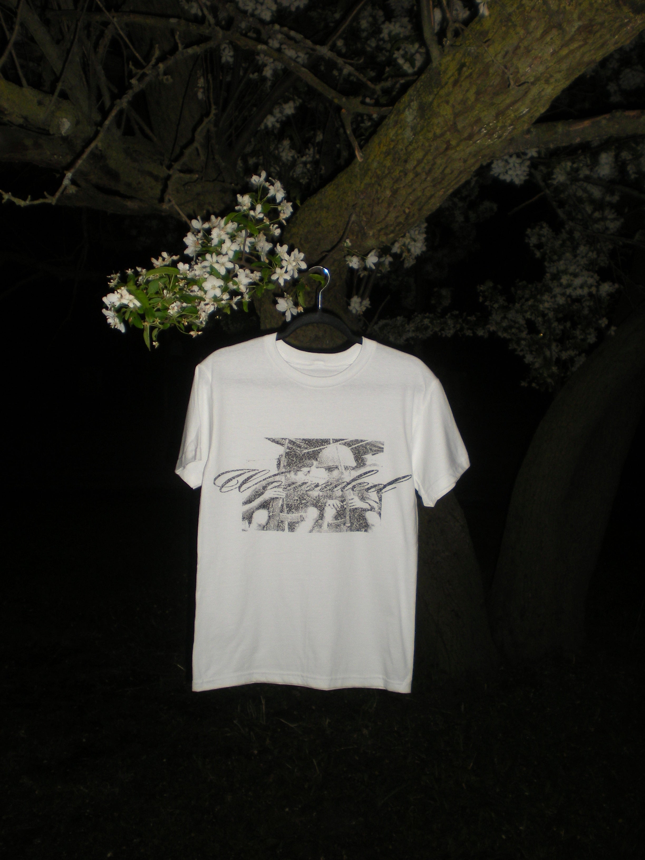 "WOUNDED" TEE